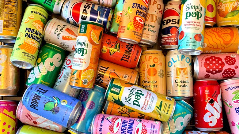 A top down view of piles of canned prebiotic sodas