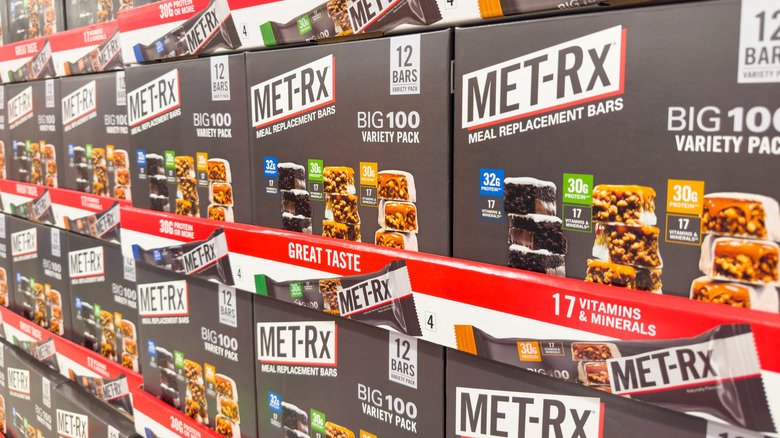 A display of MET-Rx protein bar variety packs at a store