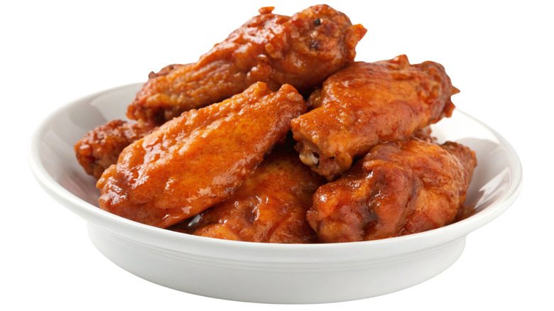 white bowl of buffalo wings