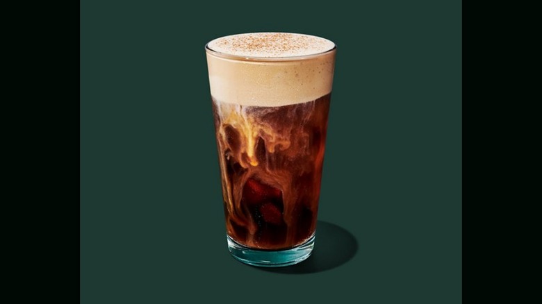 Starbucks' Pumpkin Cream Cold Brew on a green background