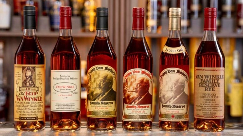A lineup of Van Winkle bourbons, including 10 year Old Rip Van Winkle, Van Winkle 12 Year, Pappy Van Winkle 13 Year, Pappy Van Winkle 20 year, Pappy Van Winkle 23 year, and Van Winkle Family Reserve Rye