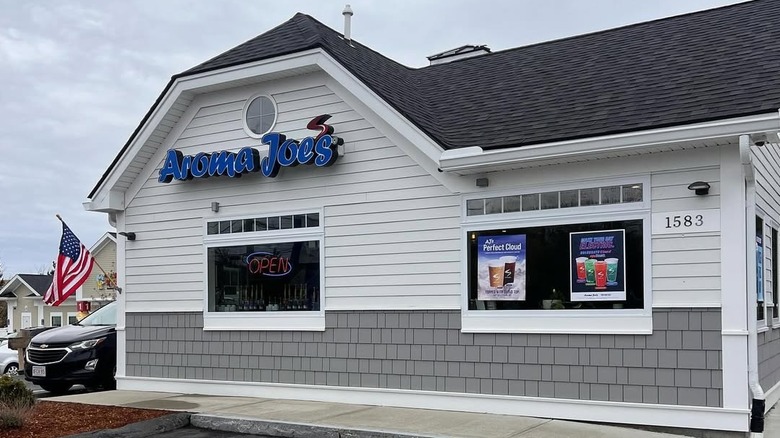 An Aroma Joe's storefront with American flag