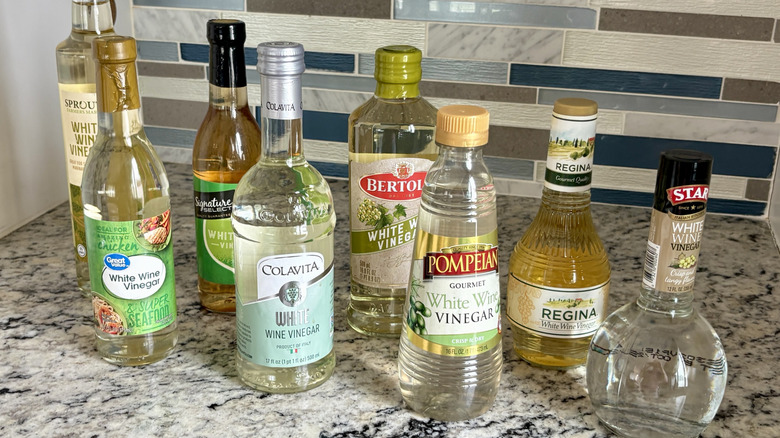 Bottles of various white wine vinegar brands