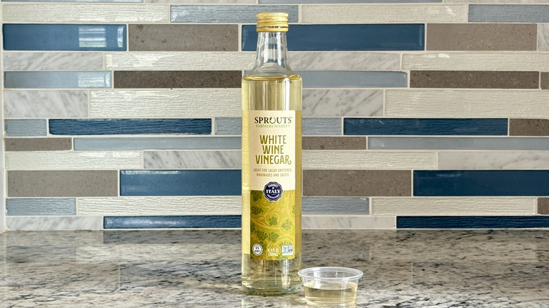 A bottle of Sprouts white wine vinegar