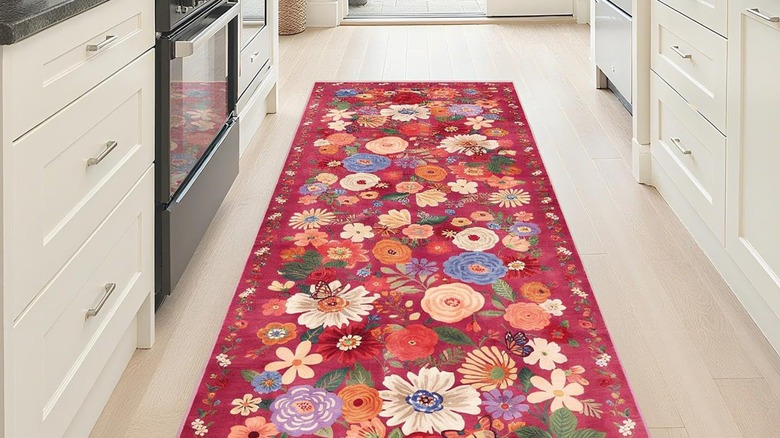 Red floral runner on kitchen floor