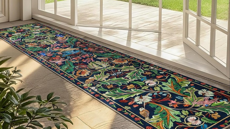 Long, botanical runner next to french doors