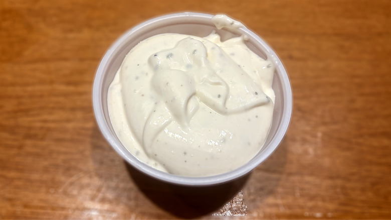 plastic container of ranch dip