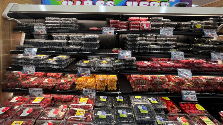 Trader Joe's berries on display in a fridge aisle