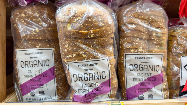 Organic ancient grain and seed bread on sale on a Trader Joe's shelf