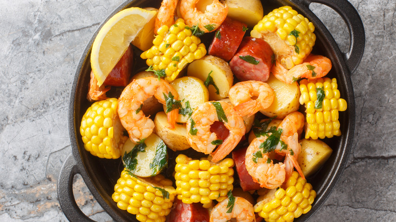 An iron pan full of seafood boil