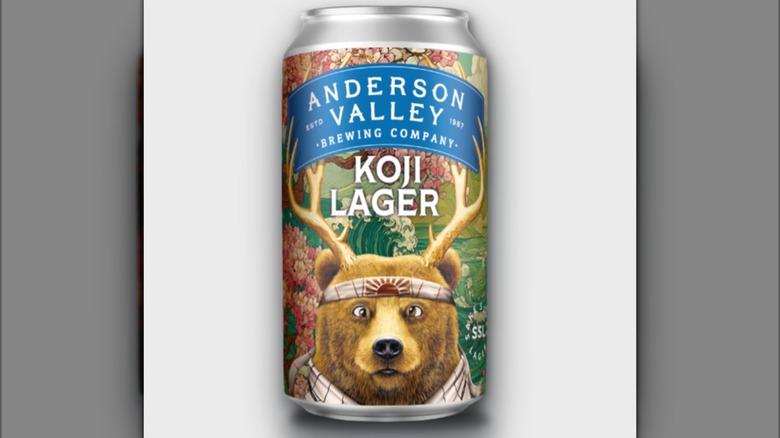 can of koji lager on white background