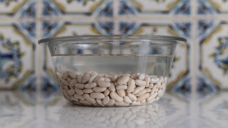 A bowl of soaking beans