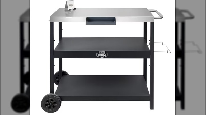 Outdoor food preparation cart against a white background