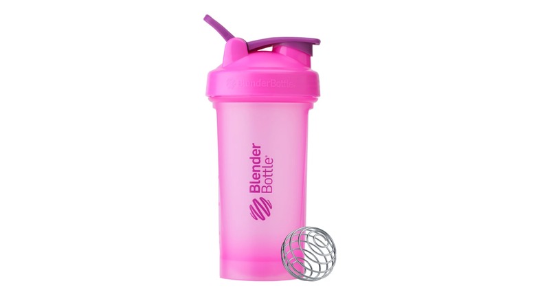 A BlenderBottle Classic 24 oz Pink Shaker Cup
