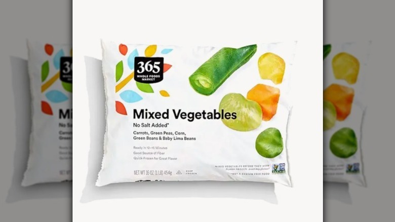 Frozen mixed veggies on white background