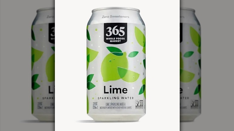 Lime sparkling water on white background