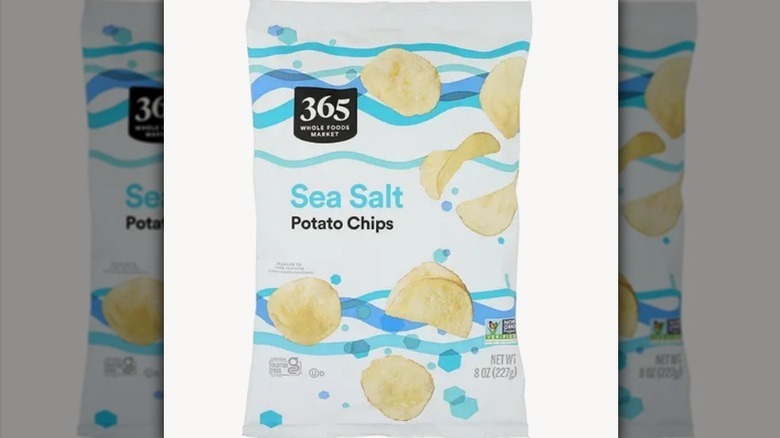 Sea salt potato chips on white background