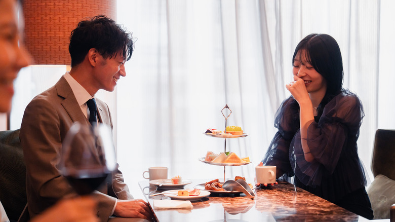 A couple enjoying afternoon tea