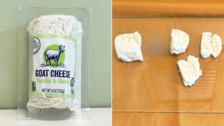 A package of Emporium Selection Garlic and Herb Goat Cheese next to goat cheese on a glass cutting board