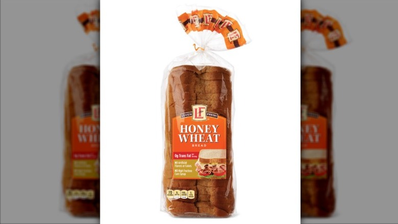 A bag of L'Oven Fresh Honey Wheat Bread