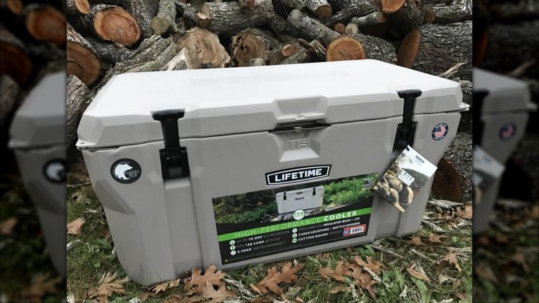 Lifetime High Performance Cooler sitting in front of cut wood