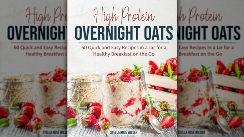 Mirrored image of High Protein Overnight Oats cover with a jar of overnight oats on the cover with lots of strawberries strewn about.