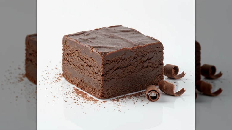 A slice of Buc-ee's chocolate fudge on a white background