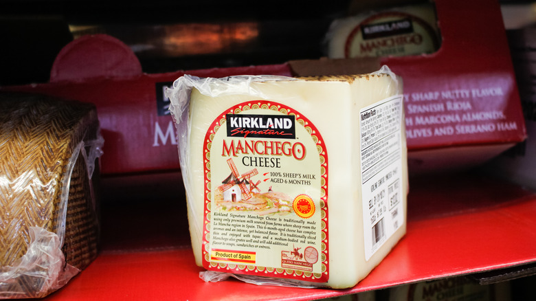 Kirkland Signature Manchego on a shelf in Costco