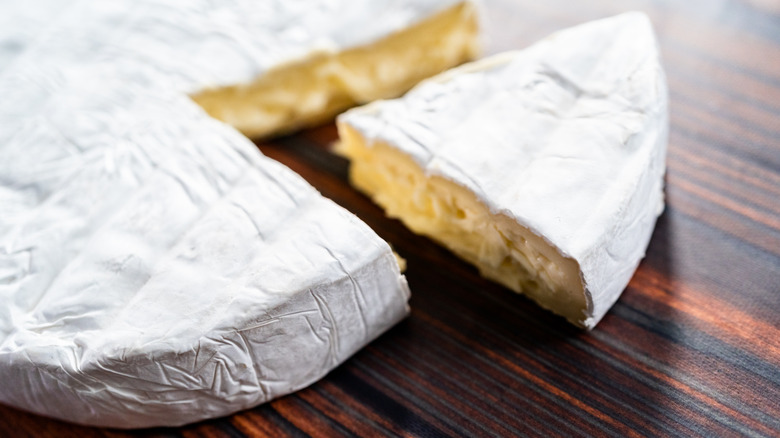 Closeup of cut wheel of Brie