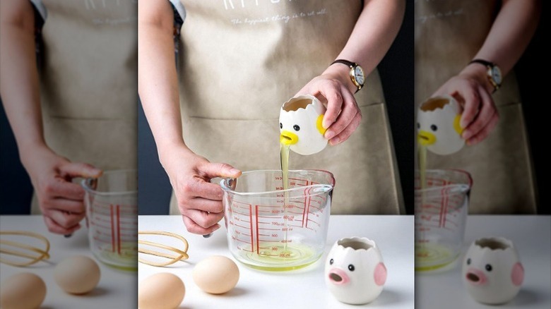 Person using egg separator