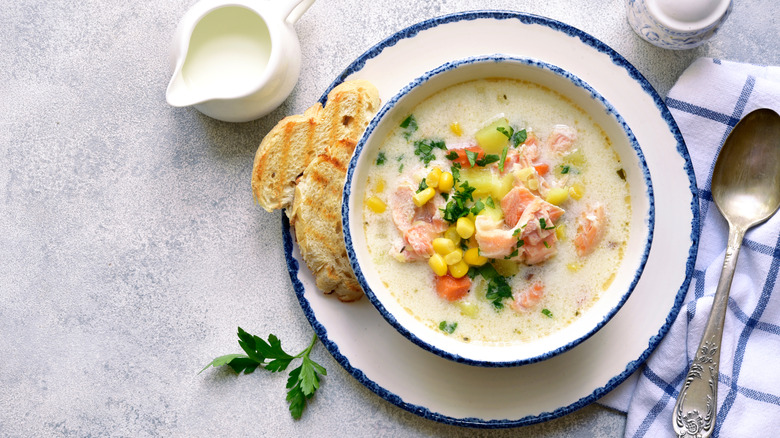 Smoked salmon chowder, served with a piece of bread