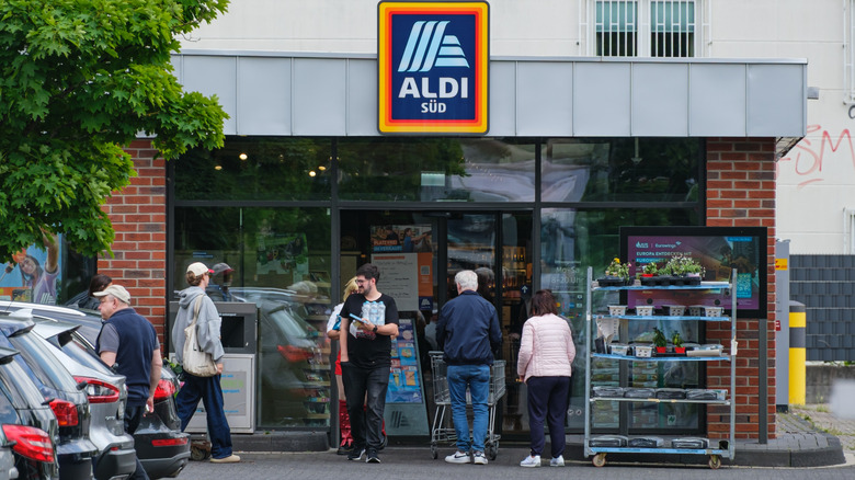 Shoppers outside of Aldi supermarket