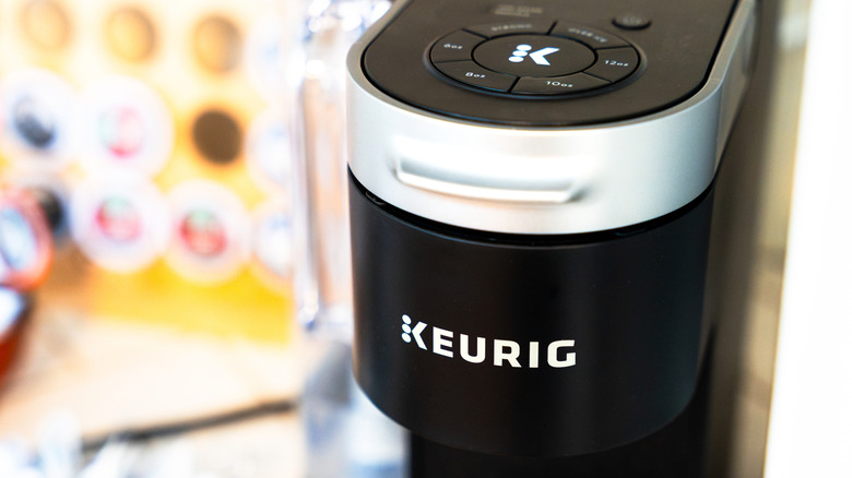Close up of Keurig brewer with K-pod stand in the background