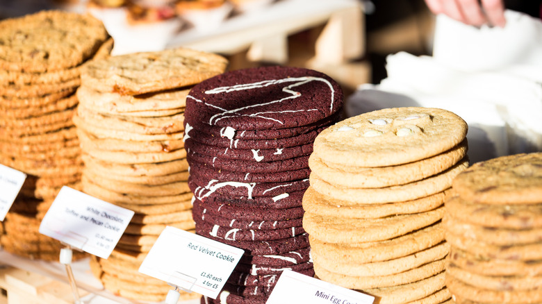 A display of cookies piled high in a display case