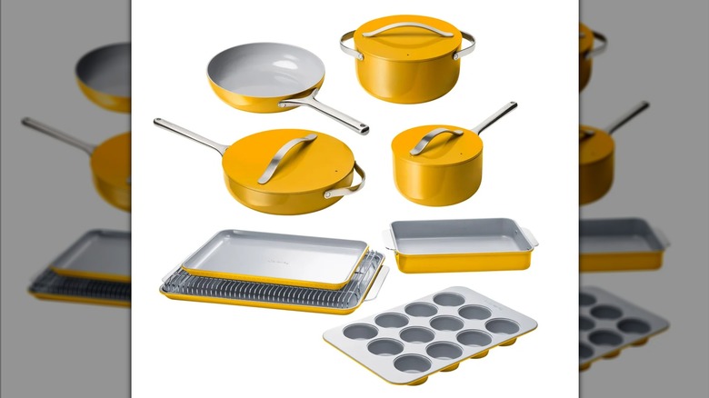 A Caraway 11-piece cookware and bakeware set, in marigold yellow with gray cooking surfaces