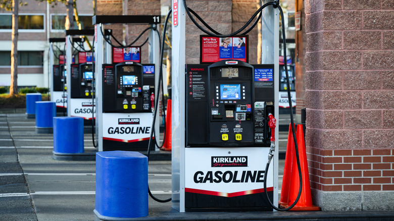 Kirkland fuel pumps at a gasoline station.