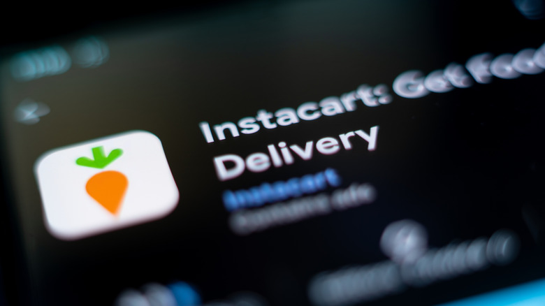 A close up of phone screen showing the app Instacart in an app store.