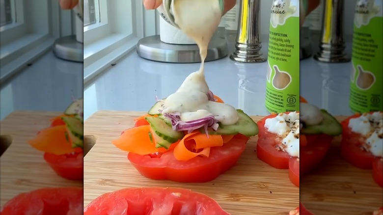 Garden salad-style tomato on a wood serving board