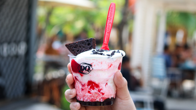 Hand holding DQ sundae