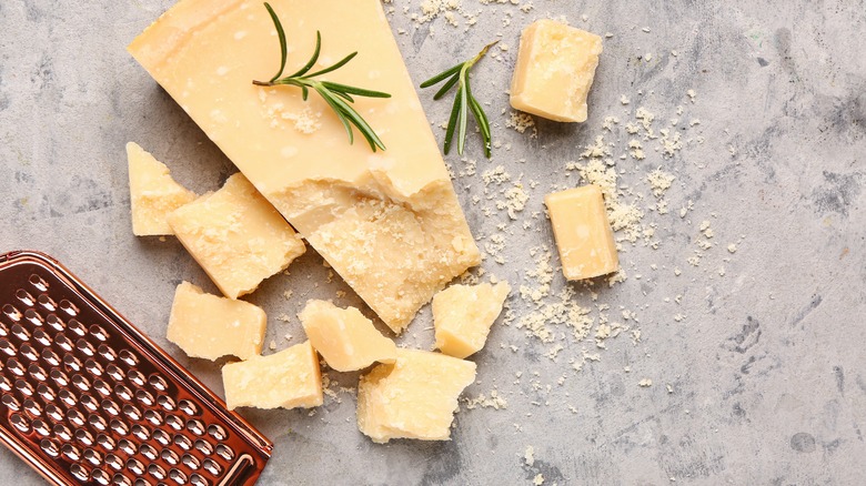 Parmesan cheese and grater