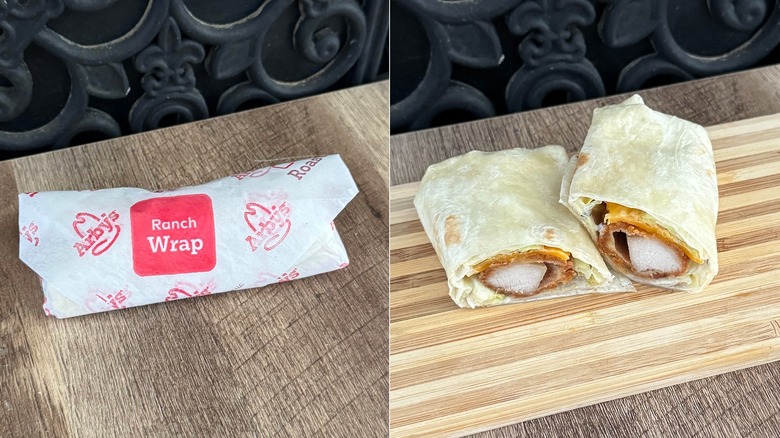 Arby's Ranch Chicken Wrap, in its packaging and sliced in half to show the filling