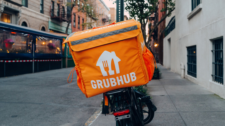 A photo of a GrubHub delivery box attached to the back of a bike