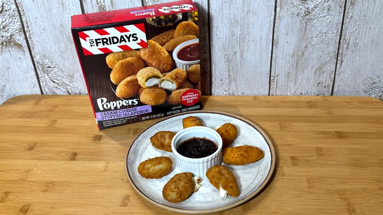 Plate of jalapeño poppers and TGI Fridays box