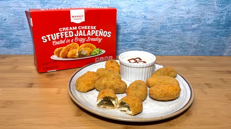 Plate of jalapeño poppers and Market Pantry box