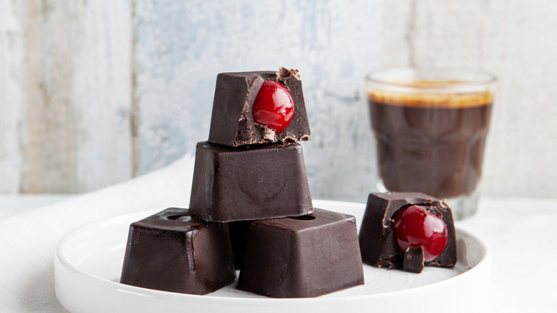 chocolate covered cherry candies on a plate