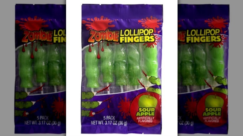Zombie lollipop fingers on a white background