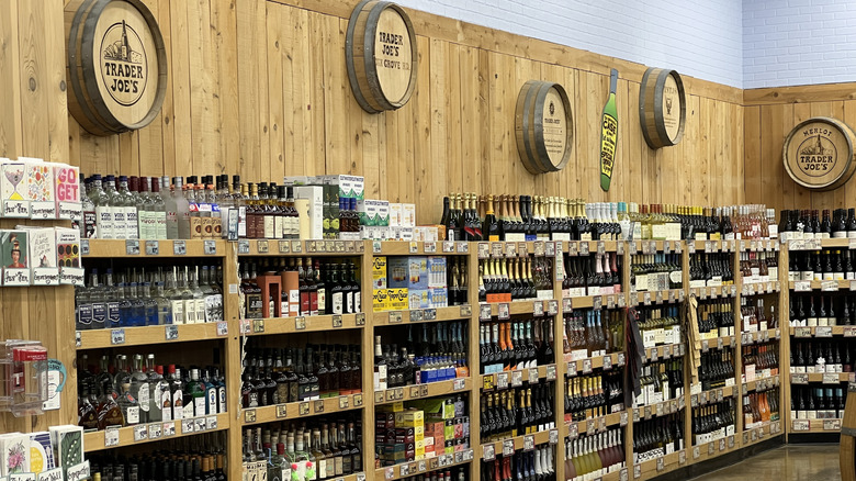 Trader Joe's wine shelves with bottles of white wine, red wine, and liquor