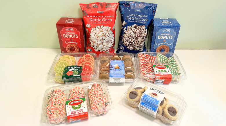 Nine holiday treats from Aldi arranged together on a green and white background