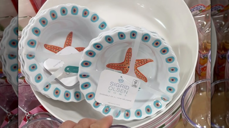 Two sets of bowls with a starfish design at a HomeGoods store