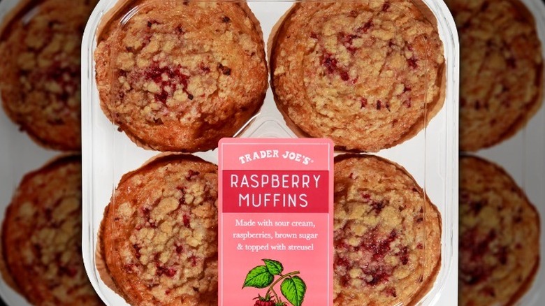 Raspberry muffins on white background